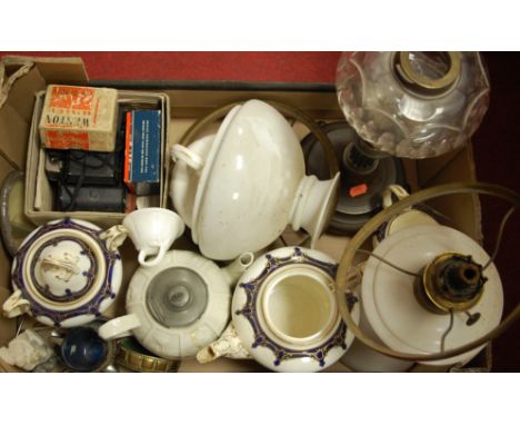 A box of miscellaneous items to include Victorian tea wares, camera, pedestal oil lamp etc