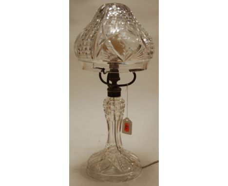 A mid 20th century cut glass table lamp and shade