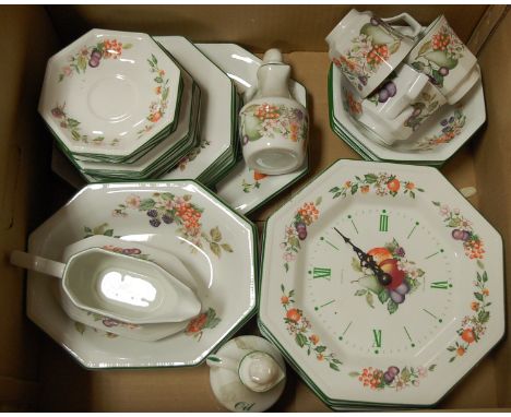 A box of assorted Johnson Bros table wares together with matching wall clock