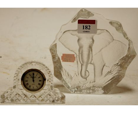 A Scandinavian glass elephant paperweight; together with a Waterford glass mantel clock (2) 