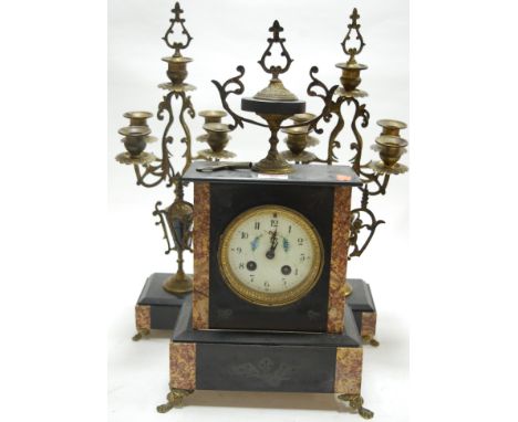 A late 19th century marble three piece clock garniture