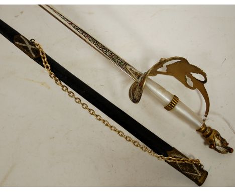 A reproduction ceremonial sword in leather scabbard 