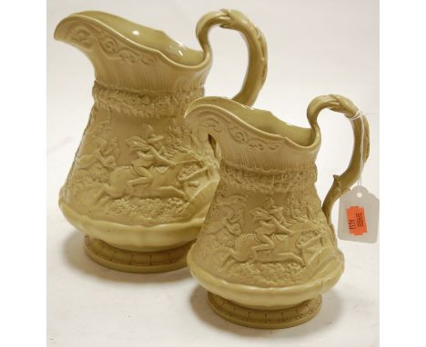 A Victorian Ridgeways and Co jug, relief decorated with hunting and tavern scenes; together with one other smaller example (2