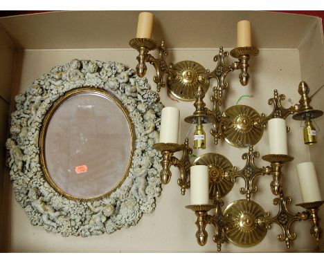 A set of  four modern brass twin sconce wall light fittings together with a reproduction mirror 