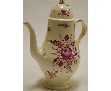 A large early 19th century Leeds creamware coffee pot and cover, having hand-painted floral decoration and intertwined strapw