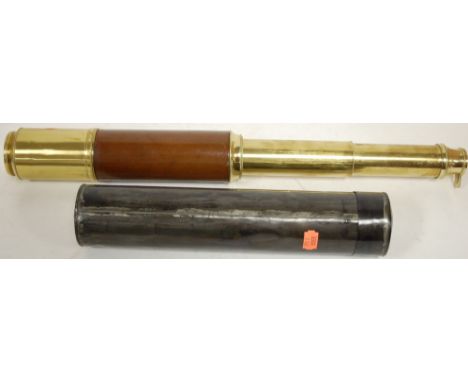 An early 20th century brass and leather clad three drawer telescope by Dolland of London, with outer case