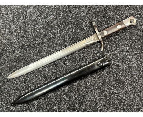 Finnish M28 Civil Guard Bayonet with single edged fullered blade 300mm in length, maker marked "Hackman &amp; Co.". Guard mar