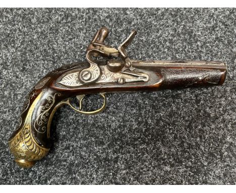 Flintlock Pistol with 120mm long barrel. Bore approx. 14mm. Inlaid white metal doration to hammer, pan and barrel in Ottoman 