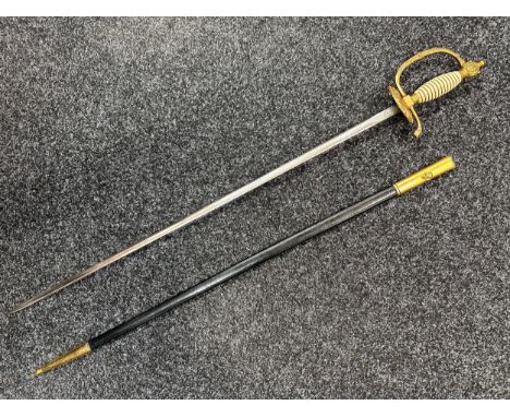 Spanish Court Sword with double edged plated blade 737mm in length marked "Toledo, Spain". Clamshell guard. White celluloid w