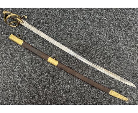 French Sword with single edged fullered blade with etched decoration of piled Arms, 885mm in length. No makers mark. Three ba