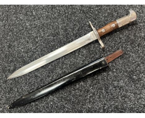 Swiss M1889 Bayonet with double fullered double edged blade 296mm in length. Maker marked "Elsener Schwyz". Wooden grips. Cro