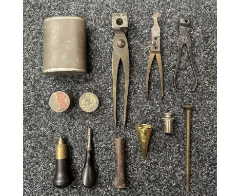 A collection of Bullet Moulds, Oil Can, Tools, Percussion Cap tins, etc 