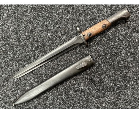 Egyptian Contract FN49 Bayonet with double edged double fullered blade 226mm in length. Wooden grips. Working release catch. 