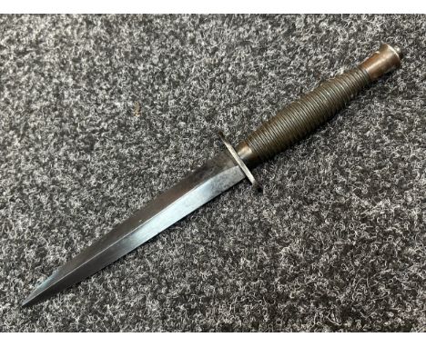 WW2 British Third Pattern Fairbairn-Sykes Fighting Knife double edged blade 167mm in length. No markings to blade. Crossguard