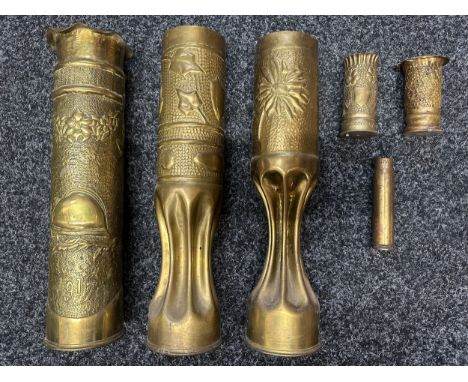 WW1 French Trench Art: three ornate vases made from French 75mm cases and two Candlesticks from 37-85 cases, plus a WW2 US 20