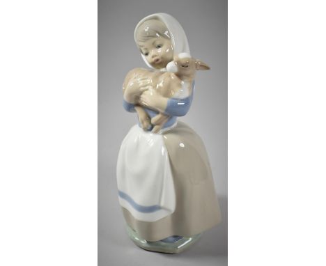 A Spanish Nao Figure of Girl with Lamb, 21cm high 