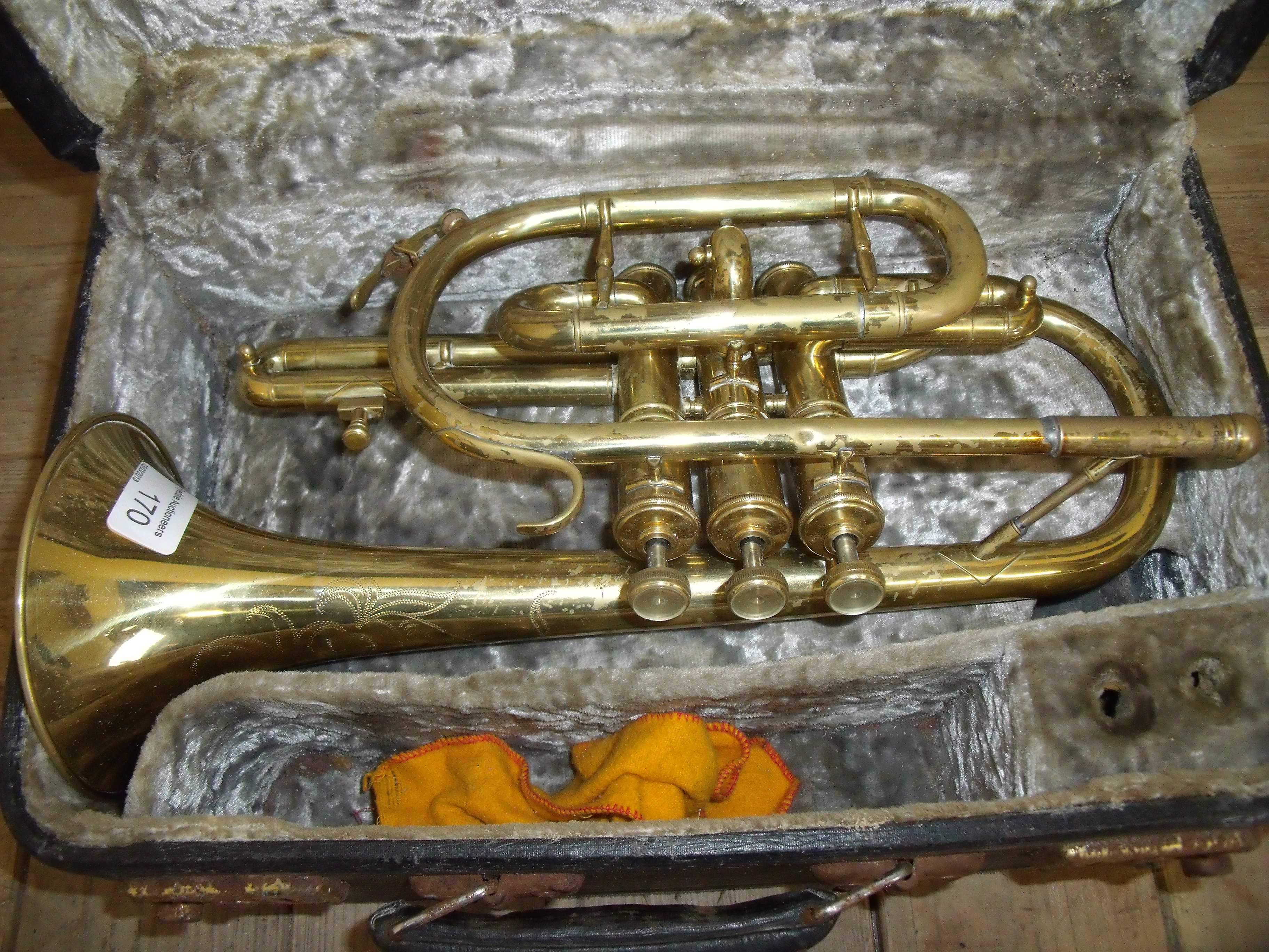 Cased Hsinghai Chinese brass (lacking mouth piece), B flat