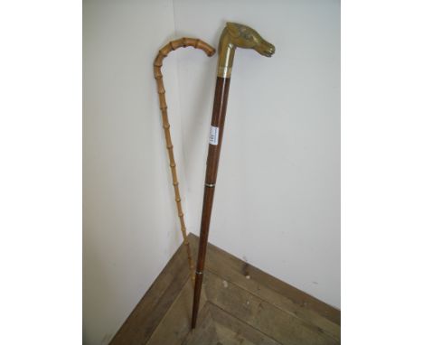 Walking stick with brass horses head handle and an early 20th C bamboo cane (2)