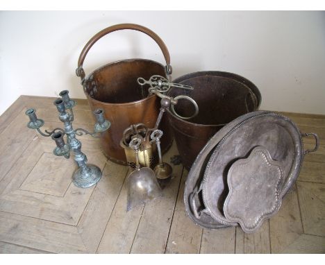 Copper coal bin with swing handle, another similar on lion paws feet, two Vintage horse bits, fire companion set, candelabra,