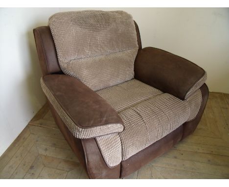 Three piece suite comprising of three seat reclining sofa and matching armchair upholstered in part suede material