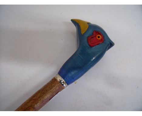 Country style walking stick, the handle carved in the form of a pheasants head (overall length 129cm) 