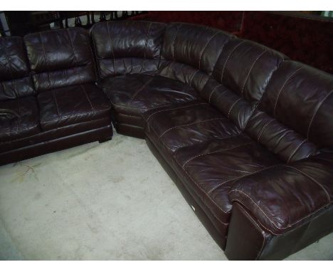 Brown leather five seat corner sofa with matching single armchair and footstool