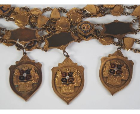 *INDEPENDENT ORDER OF ODDFELLOWS, MANCHESTER UNITY, THREE GILT METAL AND ENAMEL MEDALLION CHAINS WITH PENDANTS, with alternat