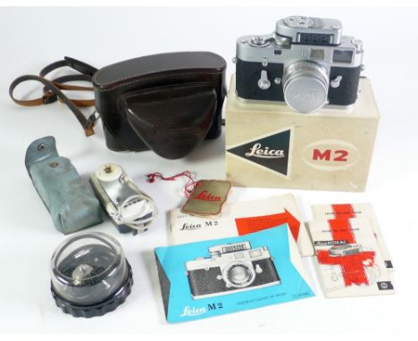 ERNST LEITZ-WETZLAR 'LEICA' M2 CAMERA NO. 1028602  with satin finish white metal and textured  black composition body, having