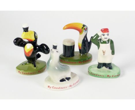 SET OF FOUR CARLTONWARE CHINA MY GOODNESS MY GUINNESS FIGURES, two toucans, sealion and zoo keeper, 4 ½" (11.4cm) high and sm