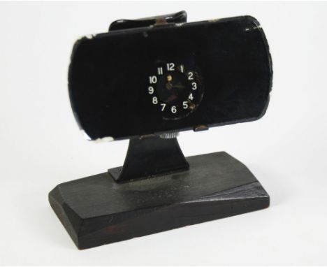 EARLY TWENTIETH CENTURY SMITH'S WIND-UP CLOCK in a motor car rear view mirror pattern frame, complete with black metal gimbal