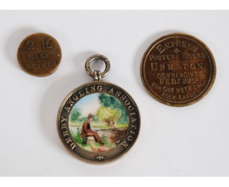 CIRCA 1920's BRASS PICTURES TOKEN 'CHARLIE CHAPLIN,  IN THE GOLD RUSH' at the Empress Picture House, Urmston, commencing Feb 