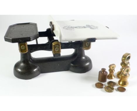PAIR OF 19TH CENTURY CAST METAL AND CERAMIC PRODUCE SCALES, with  eight various brass workings