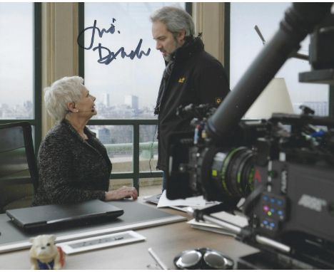 Bond Star, Judy Dench signed 10x8 colour photograph pictured during her role as M. Good condition. All autographs come with a