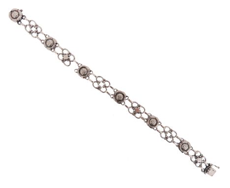 A silver foliate bracelet by Georg Jensen, design no. 50, post-1945, designed as alternating quatrefoil links between blossom