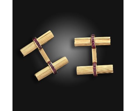 A pair of ruby and gold striated bar cufflinks by Boucheron, signed Boucheron OR750 and A340 2673, 2.5cm wide, fitted case by
