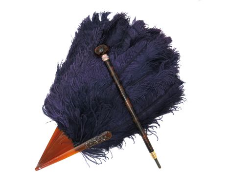 An early 20th century ostrich feather and tortoiseshell panel fan, with diamond-set Art Nouveau design to the front panel and