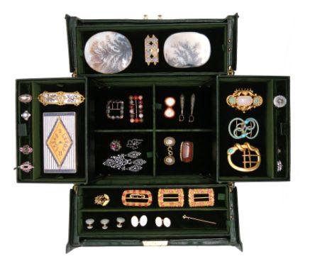 A green leather jewellery casket containing various items of jewellery, including an 18th century three-row cluster ring set 