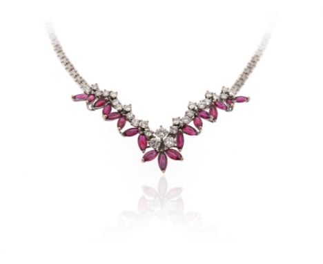 A ruby and diamond-set gold necklace, set with clusters of graduated round brilliant-cut diamonds and marquise-shaped rubies 