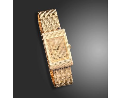 A yellow and pink gold Reflet wristwatch by Boucheron, yellow engine-turned pattern to the case and integrated band and pink 