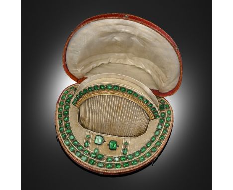 A mid 19th century green paste and silver-gilt parure, comprising a hair comb, a graduated necklace, a pair of graduated brac