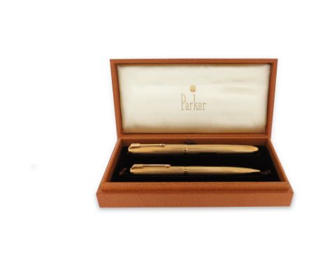An 18ct gold Parker pen and pencil, Duette, with engine-turned decoration and London hallmarks for 1961, case