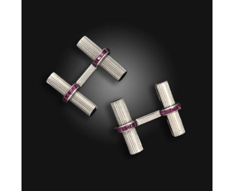 A pair of French ruby-set striated bar cufflinks by Lestret, set with calibré-cut rubies in white gold, French control marks,