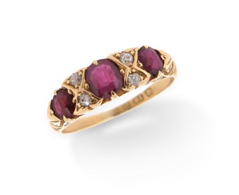 A late 19th century ruby and diamond half hoop ring, set with graduated oval-shaped rubies and single-cut diamonds in 18ct ye