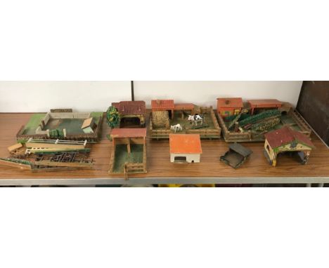 A collection of vintage model farmyard buildings and a Starlight projector screen 