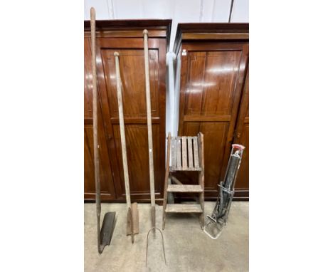 Three vintage gardening tools and a pine stepladder and a foot pump 