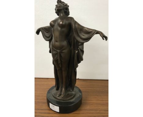 An Art Deco style bronze figure of semi nude female,  on black marble socle