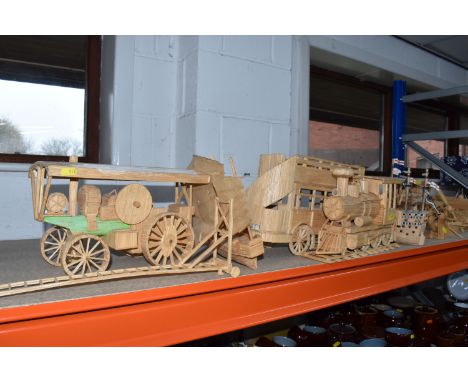 A LARGE GROUP OF MATCH-STICK AND WOODEN HANDMADE MODELS comprising a steam engine, a bi-plane, an oil pump, a galleon, an Asi