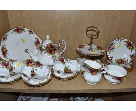 A ROYAL ALBERT 'OLD COUNTRY ROSES' TEA SET comprising a teapot, six tea cups, six saucers (two with signs of restoration), si