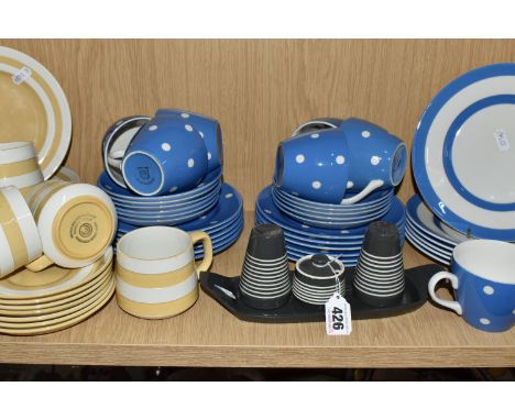 A COLLECTION OF TG GREEN TEA AND DINNER WARE, comprising a charcoal grey 'Sark' pattern cruet set, six blue and white Cornish