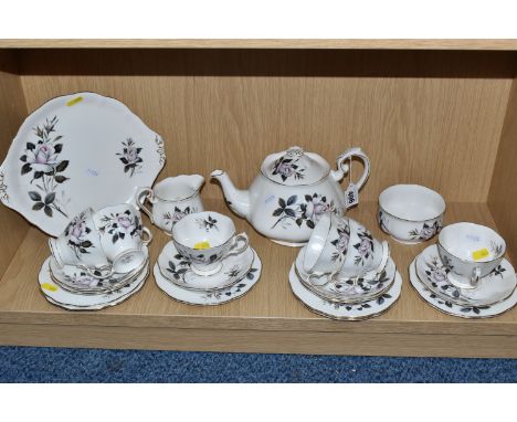 A ROYAL ALBERT 'QUEEN'S MESSENGER' TEA SET  comprising a teapot, six tea cups, six saucers, six side plates, a sugar bowl, a 